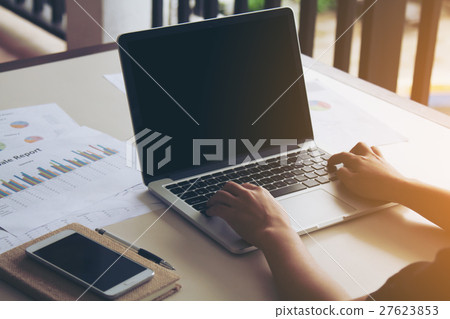 Business woman working on laptop. Business woman working on laptop. 27623853