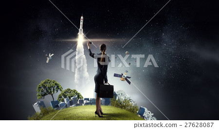 Businesswoman catching moment on her mobile 27628087