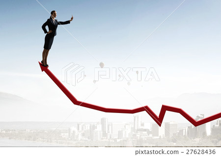 Businesswoman catching moment on her mobile 27628436