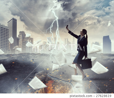 Businesswoman catching moment on her mobile Businesswoman catching moment on her mobile 27628619