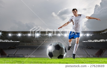Soccer player at sport arena 27628689