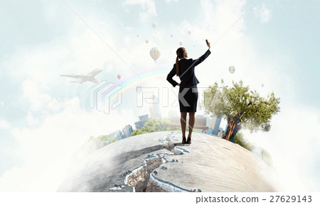 Businesswoman catching moment on her mobile 27629143