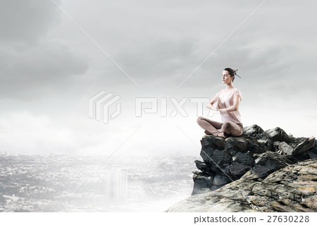 Girl practicing yoga Girl practicing yoga 27630228
