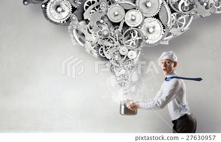 He is cooking something special 27630957