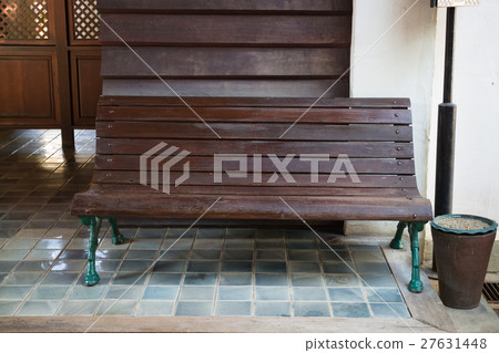Old wooden bench in public train station Old wooden bench in public train station 27631448