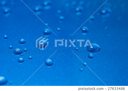 Abstract blur water drops on blue background Abstract blur water drops on blue background 27633486