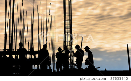 construction worker silhouette on the work place construction worker silhouette on the work place 27635540