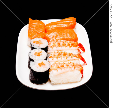 sushi in white plate on black background 27637322