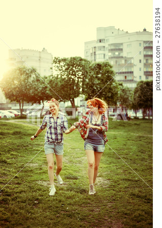 Young happy beautiful best friends girls Young happy beautiful best friends girls 27638194