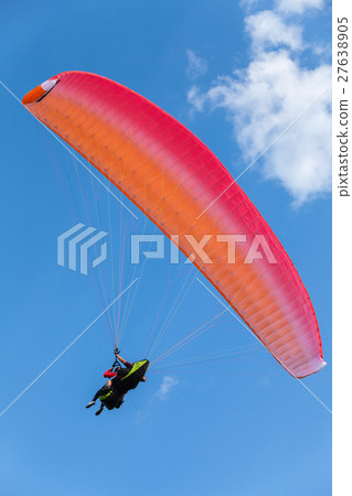 Paragliding in blue sky with clouds, tandem 27638905
