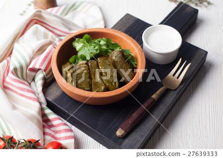 dolma with parsley and sour cream still life in a 27639333
