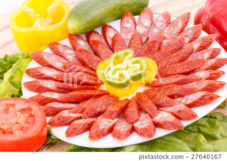 Saausages and vegetables 27640167