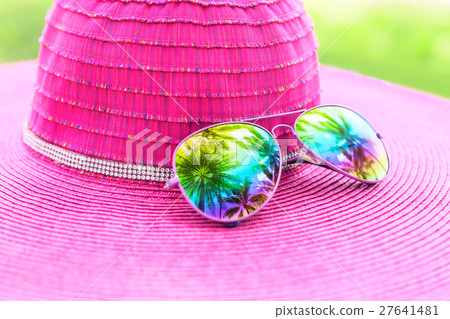 Pink summer hat and colorful sunglasses 27641481