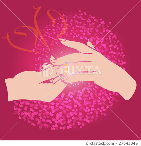 Groom puts the ring on the bride hand. Groom puts the ring on the bride hand. 27643049