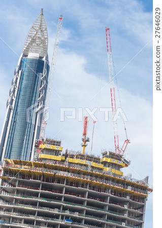 Skyscrappers construction site with cranes on top 27646029
