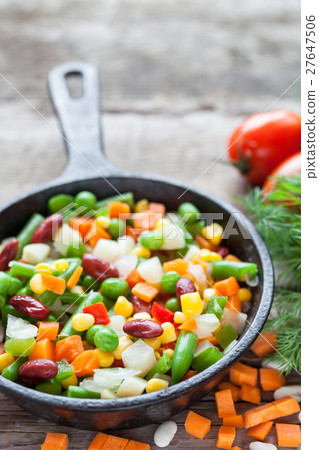 Mixed vegetable meal in old black frying pan 27647506