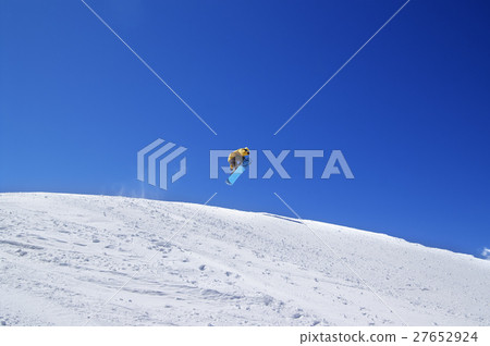 Snowboarder jump in terrain park at ski resort  27652924