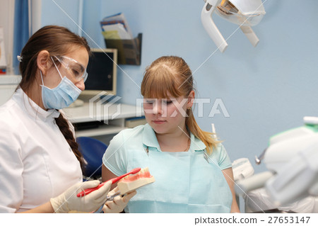 Patient at a reception at the dentist 27653147