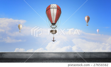 Aerostats flying over sky 27658382
