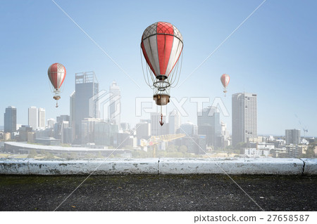 Aerostats flying over sky 27658587