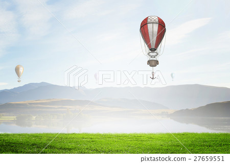 Aerostats flying over sky 27659551