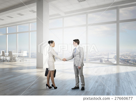 Business partners handshake Business partners handshake 27660677