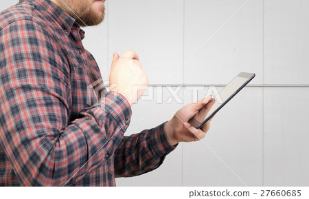 Man using digital tablet Man using digital tablet 27660685