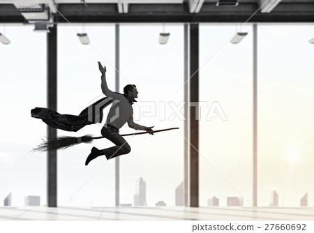 Man fly besom in office Man fly besom in office 27660692