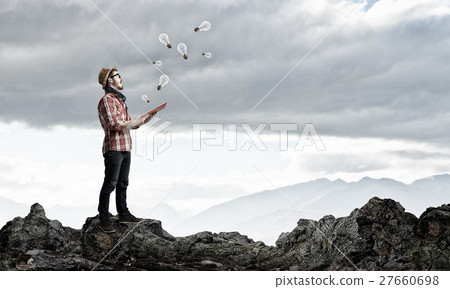 Hipster guy with book 27660698