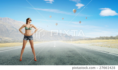 Hitch hiker woman on road Hitch hiker woman on road 27661428