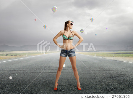 Hitch hiker woman on road 27661505