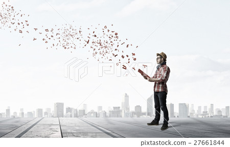 Hipster guy with book 27661844