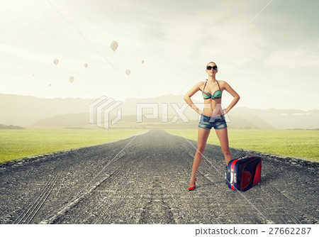 Hitch hiker woman on road 27662287