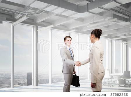 Business partners handshake Business partners handshake 27662288