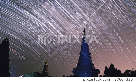 view of buddhist pagoda and startrail in galaxy view of buddhist pagoda and startrail in galaxy 27664339