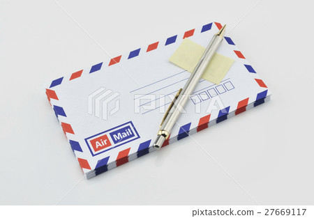 Stack of air mail envelopes with pen and stamp Stack of air mail envelopes with pen and stamp 27669117