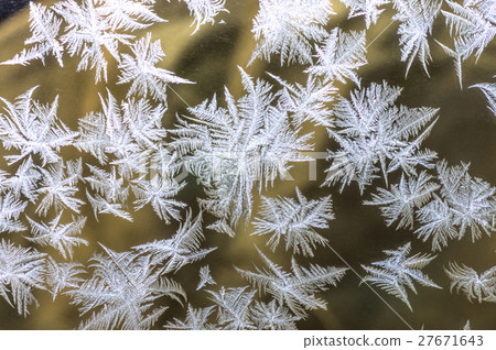Snowflakes on glass Snowflakes on glass 27671643