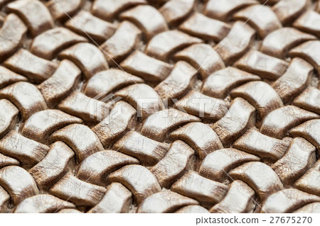 Genuine wicker leather texture, brown color, close 27675270
