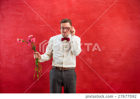 Young beautiful man with flowers 27677092