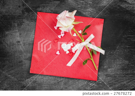 The love letter hangs on rope and a flower 27678272