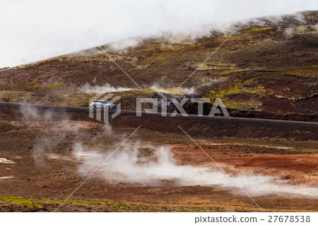 Car on a road at Hverir geothermal area Car on a road at Hverir geothermal area 27678538