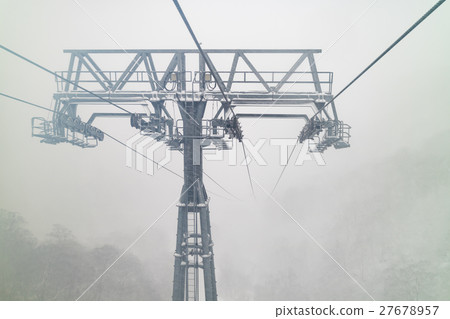 Electric poles for rope way with snowing and rain 27678957