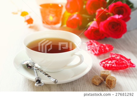 Romantic tea for two with candles and roses 27681292