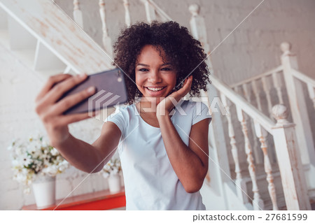 Beautyful african girl in white t-shirt make 27681599