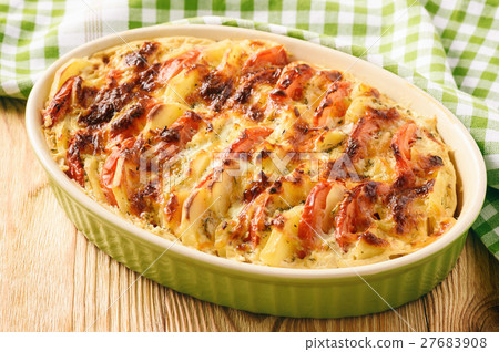Potato casserole with tomatoes, garlic and cheese. Potato casserole with tomatoes, garlic and cheese. 27683908
