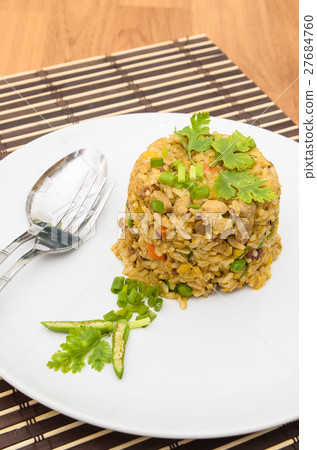 Fried rice yellow curry with pork on bamboo mat Fried rice yellow curry with pork on bamboo mat 27684760