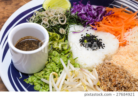 Nasi kerabu - Rice with herbs and vegetables Nasi kerabu - Rice with herbs and vegetables 27684921