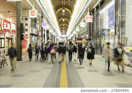 Raccoon Road Shopping District at night 27684990