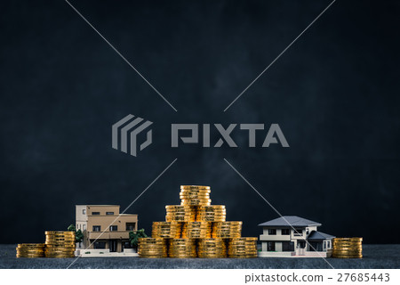 House model and lots of gold coins, copy space 27685443