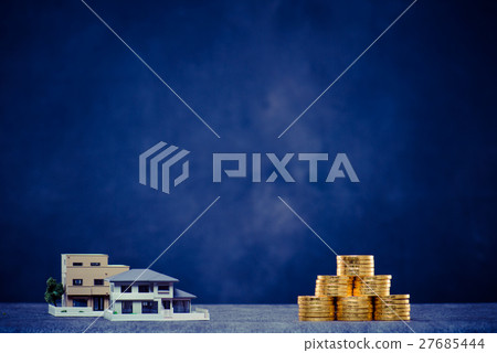 House model and lots of gold coins, copy space House model and lots of gold coins, copy space 27685444